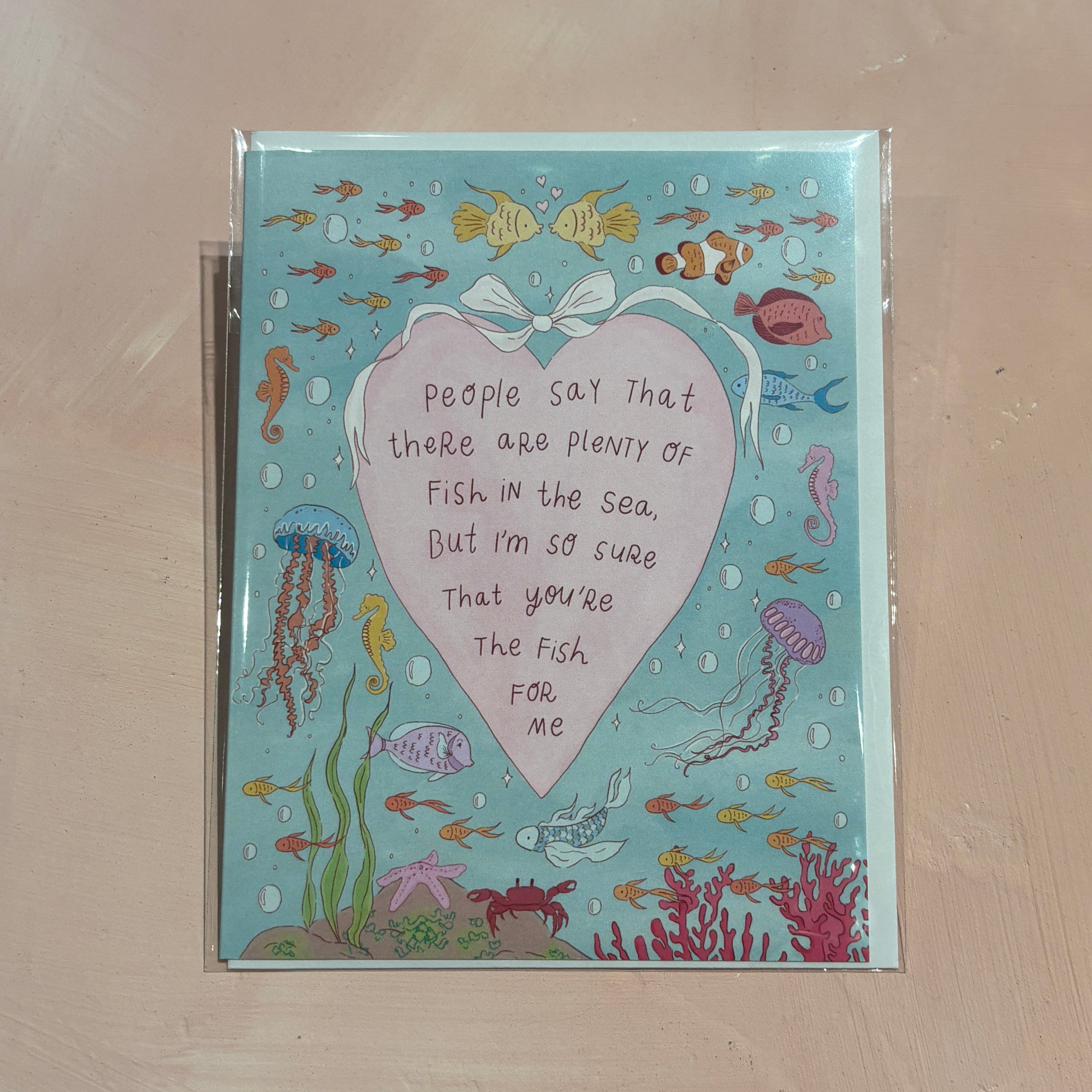 an under the sea scene with a heart reading "people say that there are plenty of fish in the sea, but I'm so sure that you're the fish for me"