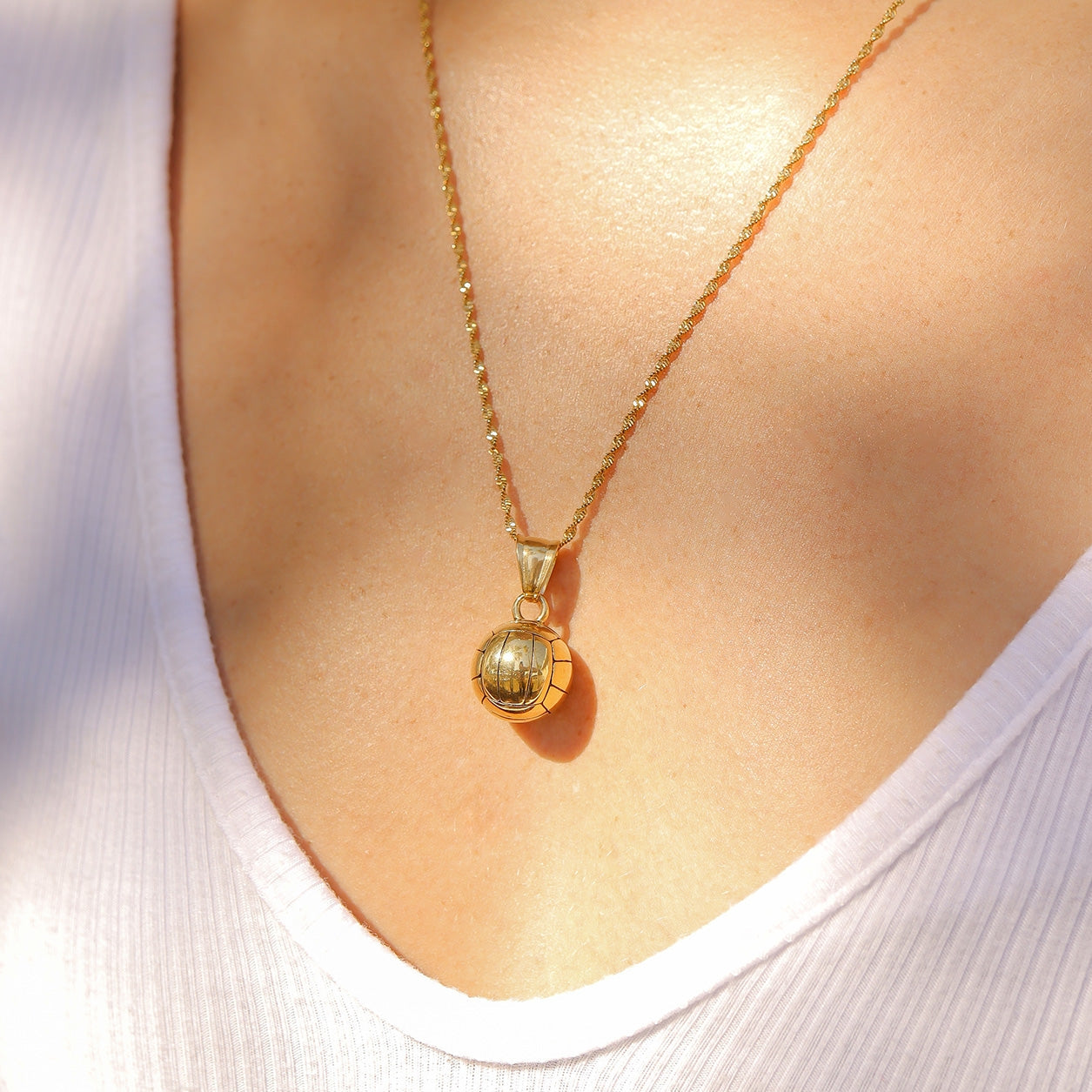 Score big with our striking 18K Gold Stainless Steel 3D Volleyball Charm, a must-have addition for sports lovers! Crafted from high-quality stainless steel and finished with a luxurious 18K gold plating, this charm offers both durability and elegance. Its lightweight design makes it perfect for adding to bracelets, necklaces, or even keychains!