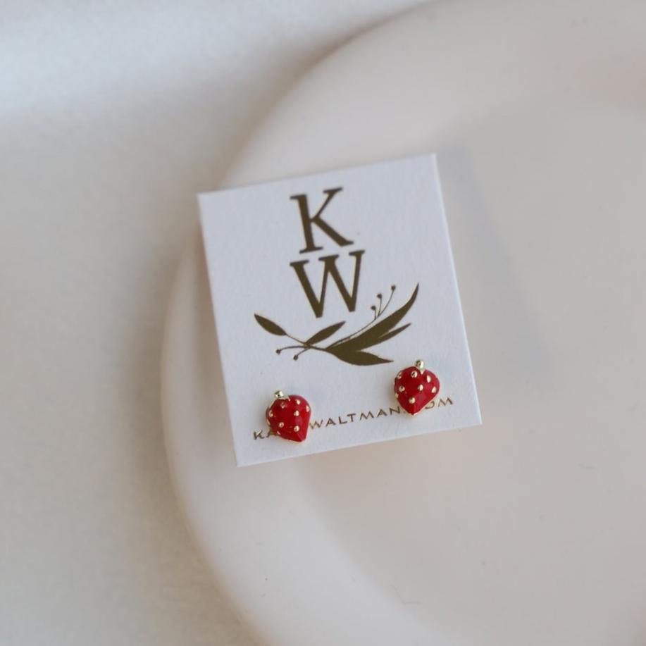 These Mini Strawberry Studs are the perfect addition to any outfit. Made with the sweetest red strawberries, these stud earrings are a charming and playful accessory for any occasion. Elevate your style with these unique and adorable studs.