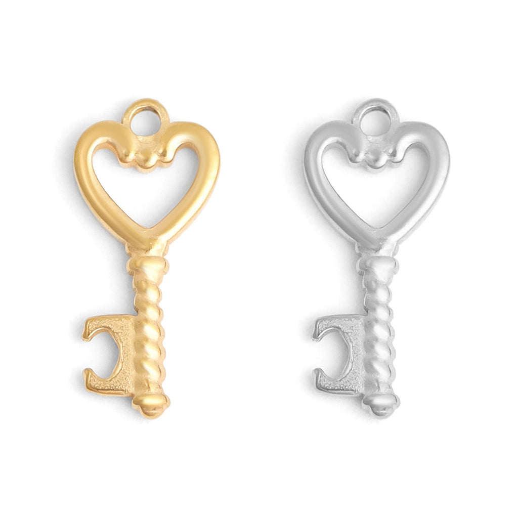 The Heart Key Charm is the ultimate symbol of forever love and the "Key" to any charm bar collection! The perfect sentimental accent to add to your charms necklaces and charm bracelets. Made with our proprietary blend of 18K Gold PVD-coated surgical-grade stainless steel &amp; designed for everyday wear.