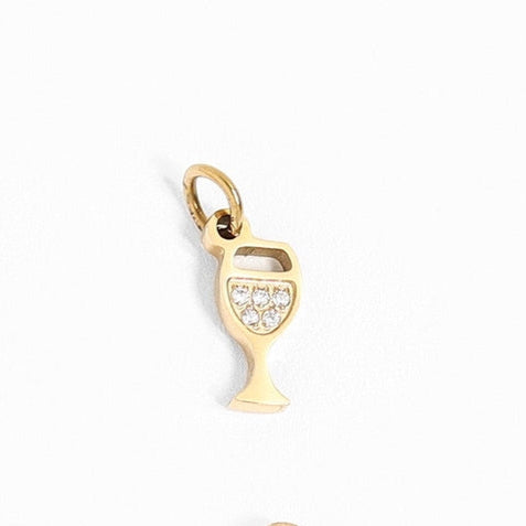 Add some sparkle to your wine night with our Wine Glass Charm! This mini wine glass charm can be worn as a bracelet or necklace, available in both gold and stainless steel. Cheers to a fun and stylish addition to your charm collection!