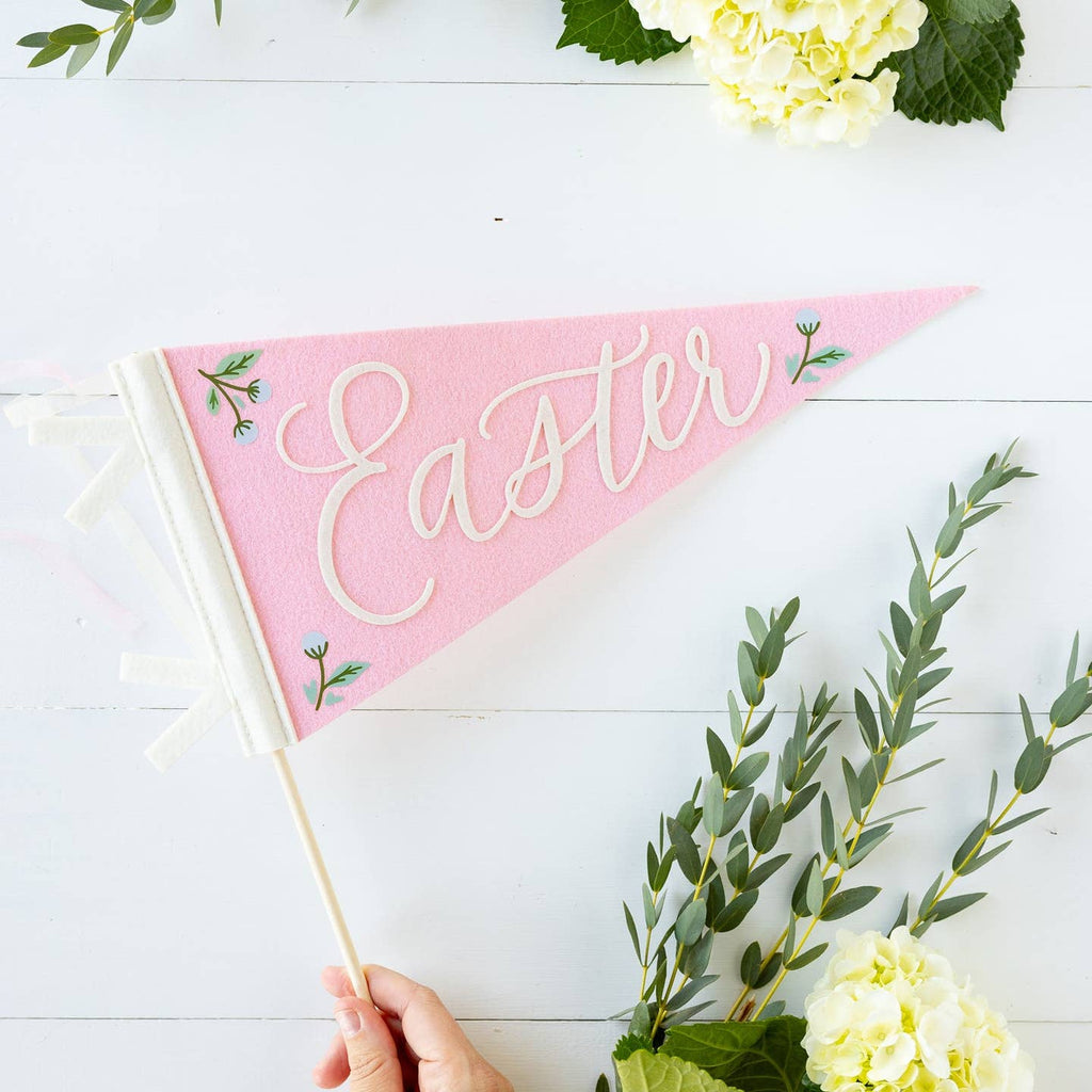 Get ready for a hoppy Easter with our Pink Easter Felt Pennant Banner! This pink felt banner features the words "happy easter" in fun, playful letters. Hang it up for a festive touch to your Easter decorations. Hop to it and get yours today!