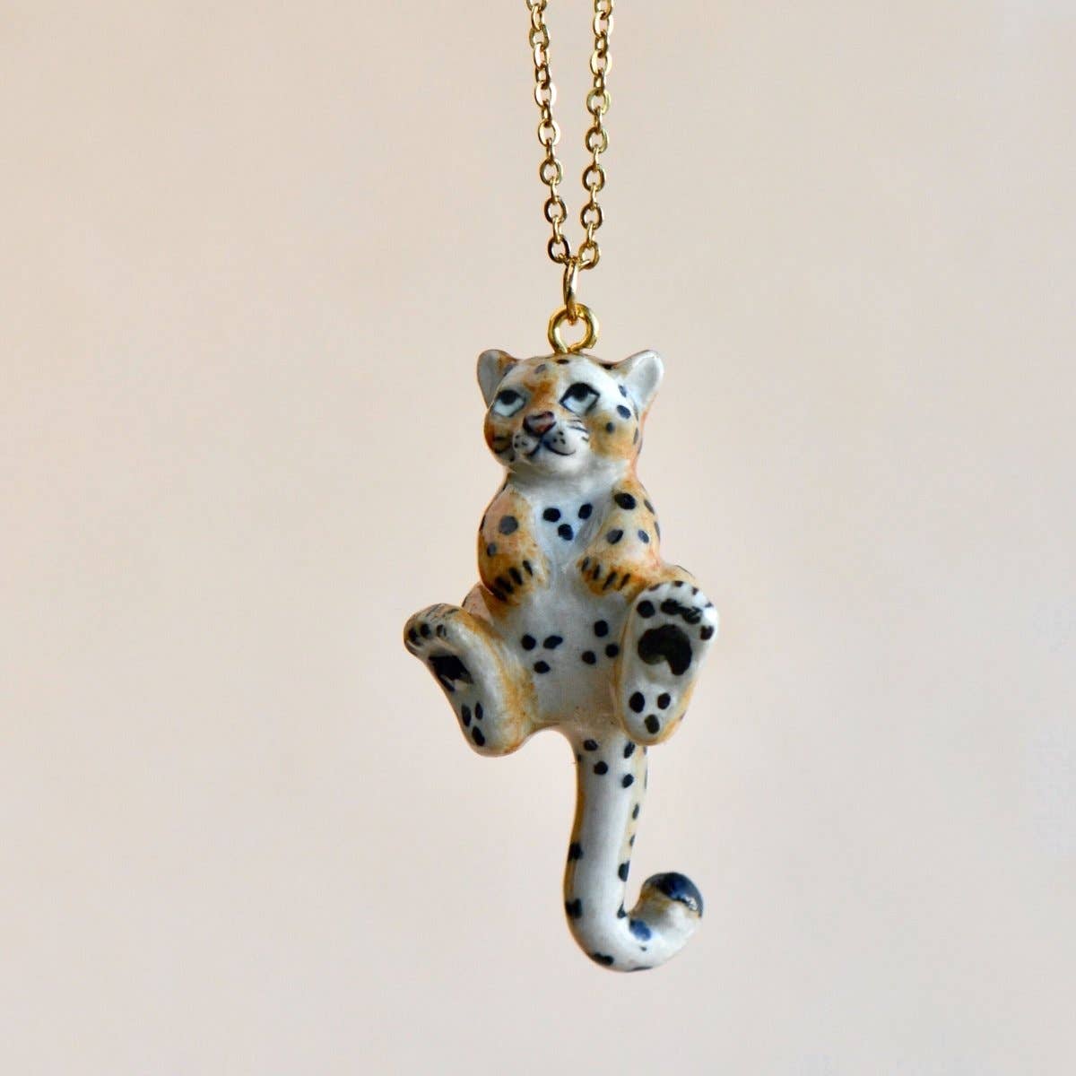 Leopards are fast, fierce, and ferocious, even as cubs! These spotted sweeties stay super cute and totally tiny when made into perfect porcelain charms, letting you channel the spunky spirit of this big cat while keeping it cuddly.