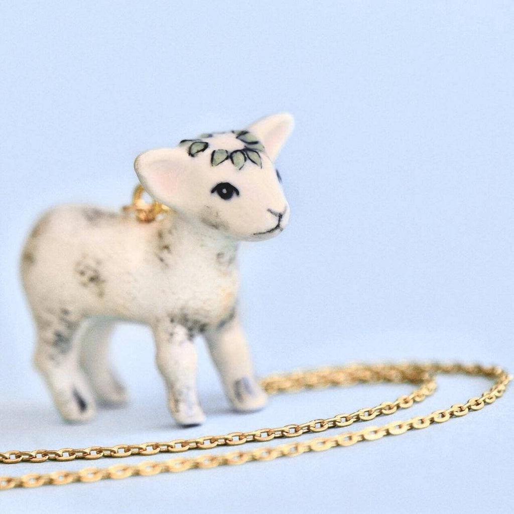 Get ready to spring into style with our Dainty Porcelain Hand Painted Mini Lamb Necklace! Made from delicate porcelain and hand painted for a one-of-a-kind look, this necklace is perfect for adding a playful touch to any outfit.