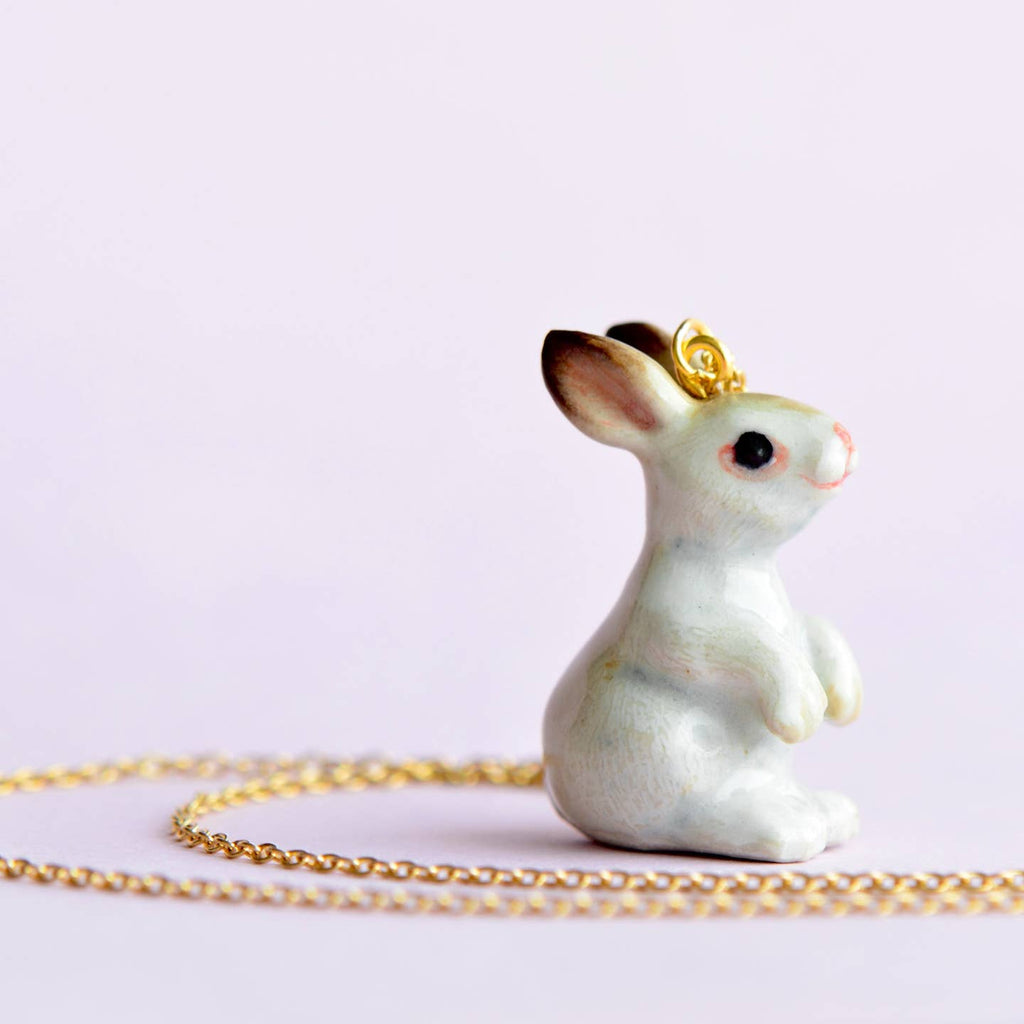 A pretty porcelain hare with a perfect pink nose! Follow it down the rabbit hole and see where it goes...

Due to the handmade nature of this product, slight variations in color and design may occur, making each piece truly one-of-a-kind. And when it comes to upkeep, a quick wipe with a damp cloth keeps your pendant looking as vibrant as ever.