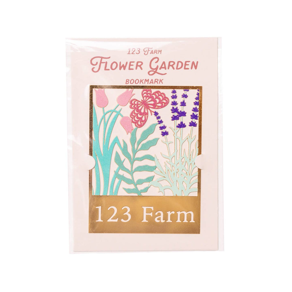 The flower garden bookmark from 123 Farm beautifully captures the essence of our organic gardens through an elegantly cut metal design. It brings a touch of nature's charm to your reading adventures.