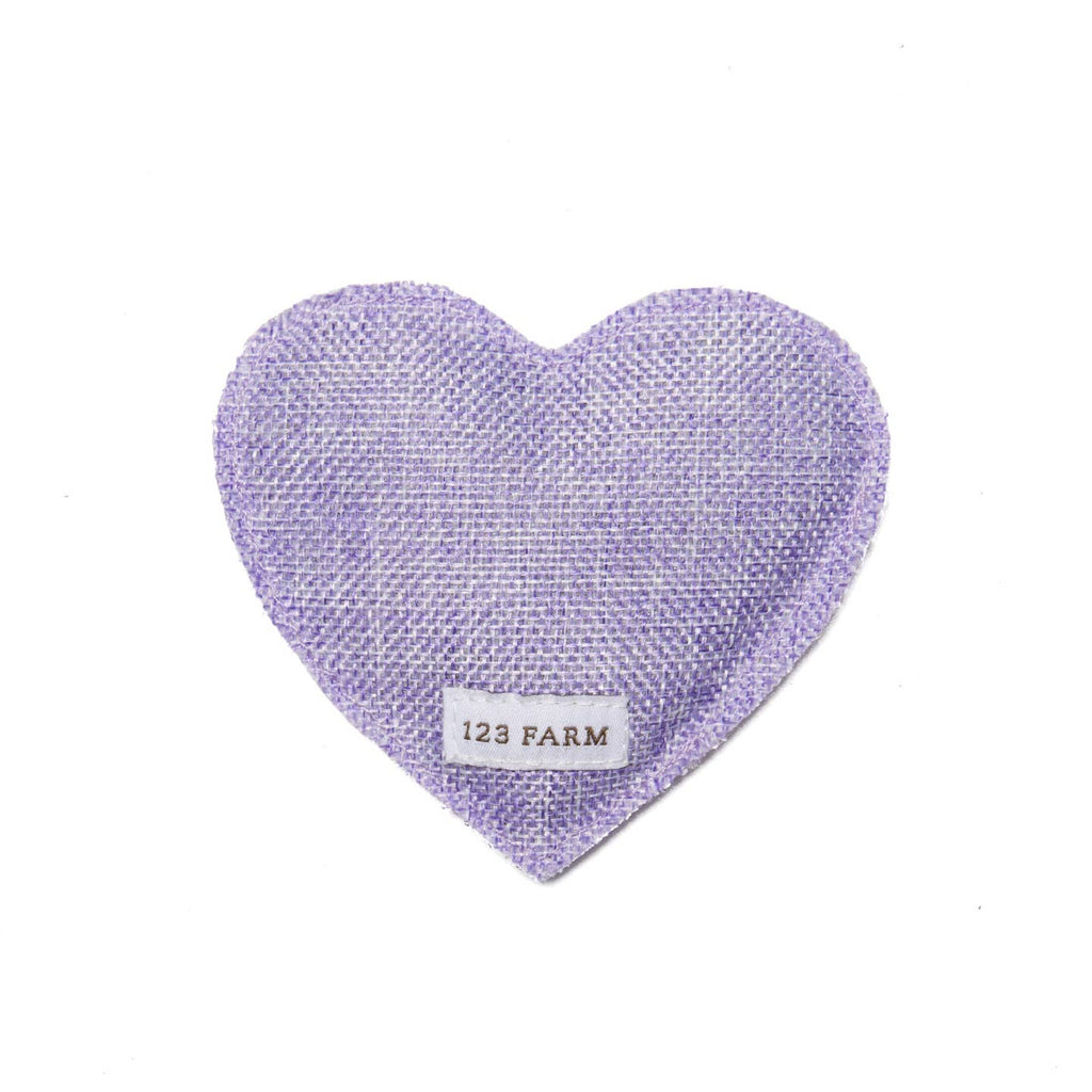 Heart-shaped sachet filled with dried organic lavender flowers from 123 Farm.