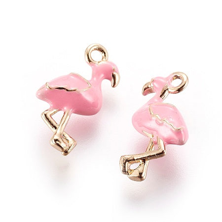 Add a touch of whimsy to your jewelry collection with our adorable Flamingo Charm. This tiny charm features a pink flamingo, perfect for adding a pop of color to any outfit. Let this charming accessory be a reminder to embrace your playful side.