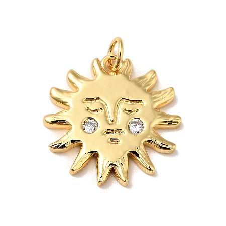 Add a touch of joy to your jewelry collection with our Gold Sunshine Face Charm. This adorable charm is perfect for any bracelet or necklace, featuring a smiley face design and sparkling cubic zirconia detail. Spread happiness and shine bright like the sun with this quirky and playful charm.