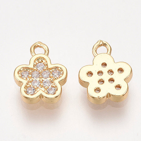Add a touch of elegance to your jewelry collection with our Gold Sparkling Flower Charm. This delicate charm features a stunning sparkling flower made of cubic zirconia, perfect for adding a bit of glam to any bracelet or necklace. Elevate your style with this beautiful and versatile charm.