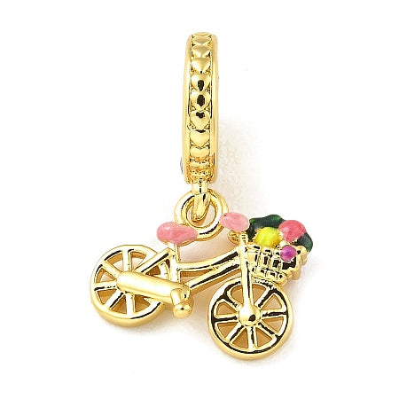 Add a touch of whimsy to your jewelry collection with our Bicycle with Basket Charm. This tiny bicycle features a basket full of colorful enamel details, all on a beautiful gold colored charm. Perfect for a bracelet or necklace, it's sure to charm any bicycle lover.