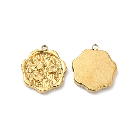 Add a touch of elegance to any bracelet or necklace with our Gold Floral Hexagon Charm. The gold color adds a luxurious touch, while the intricate floral detail brings out a feminine touch. Versatile in its hexagon shape, this charm will elevate any piece of jewelry.