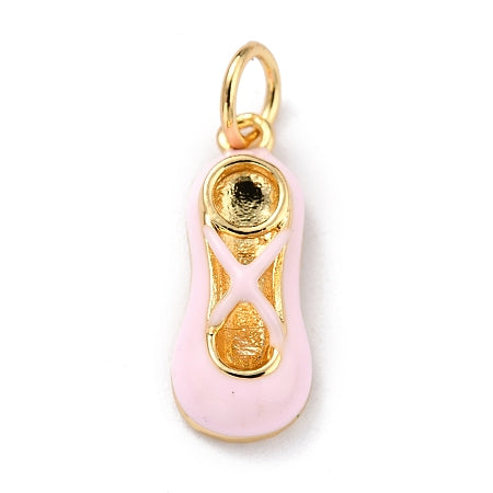 This charming gold ballet slipper charm is the perfect addition to any bracelet or necklace. With its delicate pink enamel and classic design, it's sure to add a touch of elegance to any outfit. Show off your love for ballet and accessorize in style with this stunning charm.