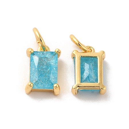 Elevate your style with our Rectangle Sky Blue Gem Charm. This gold charm features a stunning sky blue cubic zirconia, adding a touch of elegance to any bracelet or necklace. Upgrade your accessory game and stand out from the crowd with our unique and versatile charm.