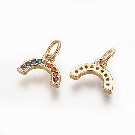 Add a touch of color and shine to any outfit with our Gold Sparkling Rainbow. Made with dazzling colorful cubic zirconia, this charm can be worn as a bracelet or necklace accessory. The perfect way to brighten up your day and add some sparkle to your look.