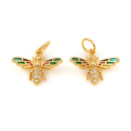 Add a touch of whimsy to your jewelry collection with our Gold Colorful Bee Charm. This charming accessory features a delicate gold bee with vibrant, colorful wings. Whether worn as a bracelet or necklace charm, it's sure to add a pop of fun to any outfit.