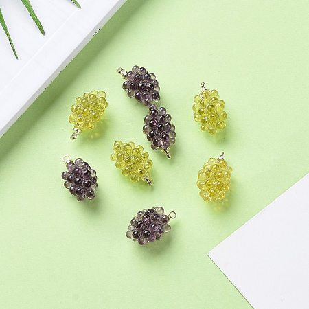 Add a touch of sweetness to your jewelry collection with our Grape Cluster Charms, available in two beautiful and vibrant colors. These charming charms can be used on both bracelets and necklaces, making them a versatile addition to your accessories. Crafted with quality resin, these charms are sure to catch the eye and add a pop of color to any outfit.