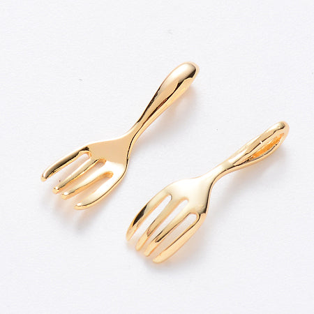 Add a touch of whimsy and charm to your bracelet or necklace with our Gold Fork Charm. The elegant gold color adds a touch of sophistication while the fork design adds a playful element. Perfect for foodies and those who appreciate unique accessories.
