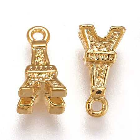 This charming 3D Eiffel Tower charm is the perfect addition to any bracelet or necklace. With its intricate design and beautiful gold color, it will be sure to catch anyone's eye. Show off your love for travel and elegance with this must-have charm.