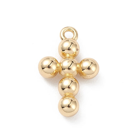 Elevate your jewelry game with our stunning Gold Bubble Cross Charm. Its exquisite gold color adds a touch of elegance to any outfit, while the iconic cross design adds a meaningful touch to your accessories. Attach it to a bracelet or necklace for a versatile and stylish addition to your collection.