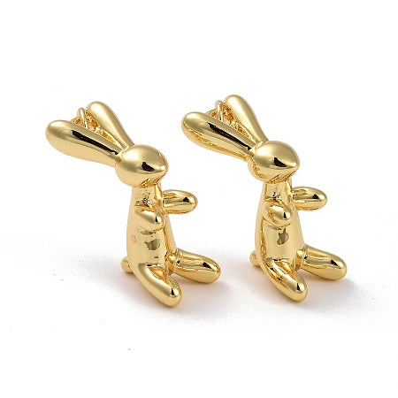 This gold rabbit charm is the perfect addition to any bracelet or necklace. Its long ears and simple design add a touch of whimsy to any outfit. Its shining gold color will catch everyone's eye and make you stand out. Add this charm to your collection today for a unique and stylish look.