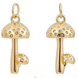 Add a touch of nature to your jewelry collection with our gold Tall Mushroom Charm. Each charm showcases a mushroom with a long stem, adding to your accessories a whimsical and enchanting touch.