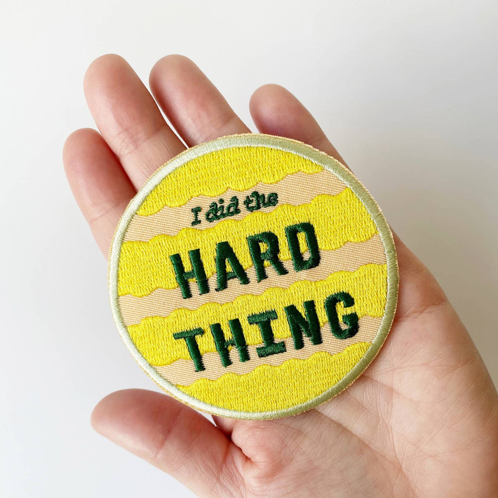 Colorfully embroidered patch measuring 3x3 inches in diameter. Iron-on backing. An inspiring patch that can be used as a badge of honor for kids and adults alike! Iron on to your favorite jean jacket or backpack.