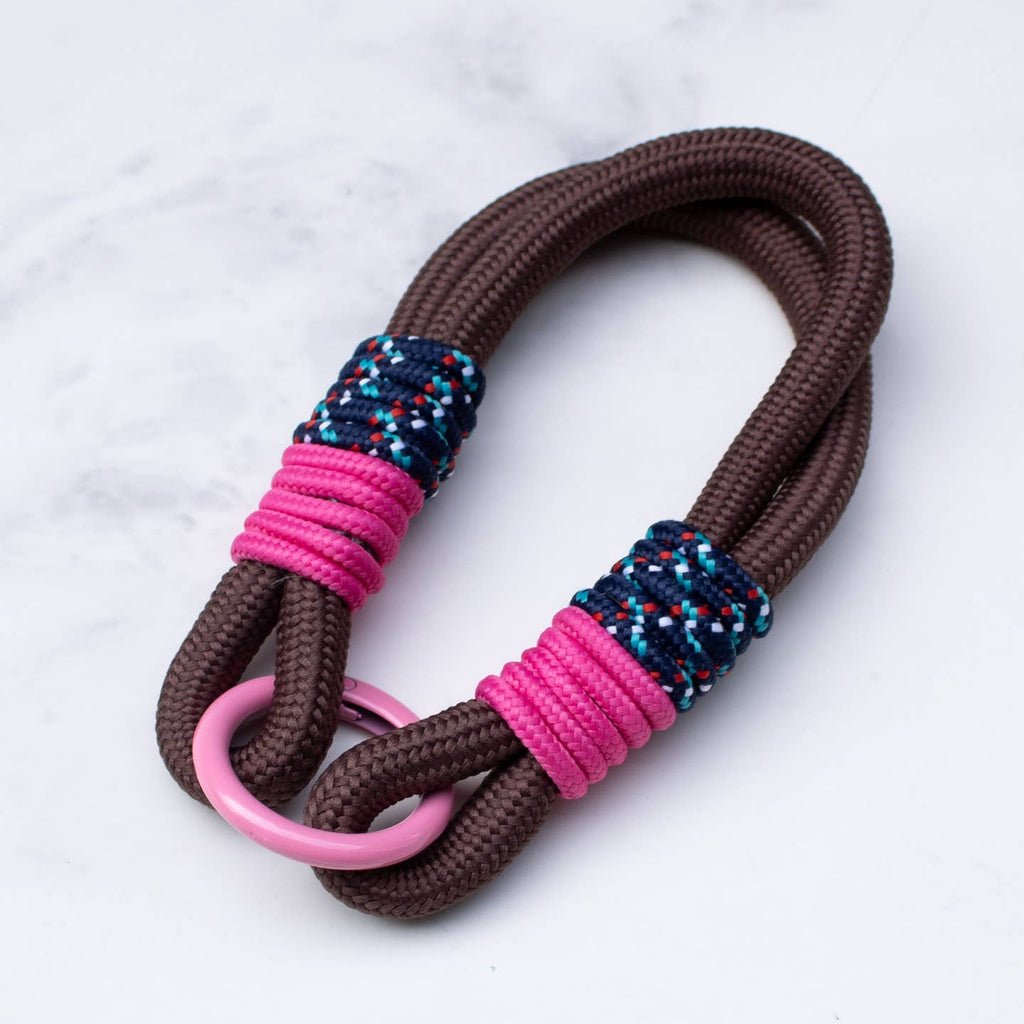 This Rope Type Bag Charm is perfect for those looking to add a touch of personality to their everyday bag. Made with sturdy rope and designed to be used as a charm, it not only keeps your keys together, but also adds a unique flair to your style. Elevate your everyday routine with this functional yet stylish accessory.