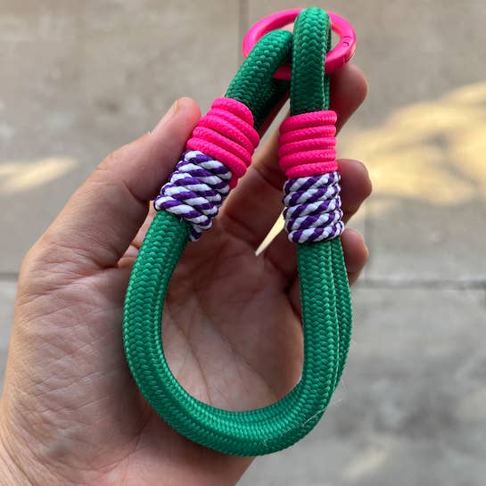 This Rope Type Bag Charm is perfect for those looking to add a touch of personality to their everyday bag. Made with sturdy rope and designed to be used as a charm, it not only keeps your keys together, but also adds a unique flair to your style. Elevate your everyday routine with this functional yet stylish accessory.