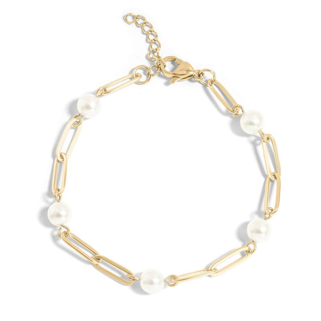 Embrace timeless elegance with the stainless steel Station Pearl Paperclip Chain Bracelet. An upgrade to our best selling chain bracelet style, this chain features luminous pearls delicately arranged along the paperclip chain, exuding sophistication and classic charm. Perfect for weddings, special occasions, or everyday wear, this Bracelet complements any outfit with effortless grace.