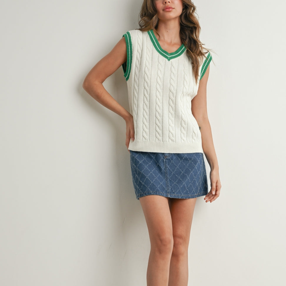 Stay cozy and stylish with this Knitted Sweater Vest. Featuring a classic sleeveless design and a soft knit texture, this versatile piece is perfect for layering over shirts or wearing on its own. Ideal for adding warmth and a chic touch to your everyday outfits.