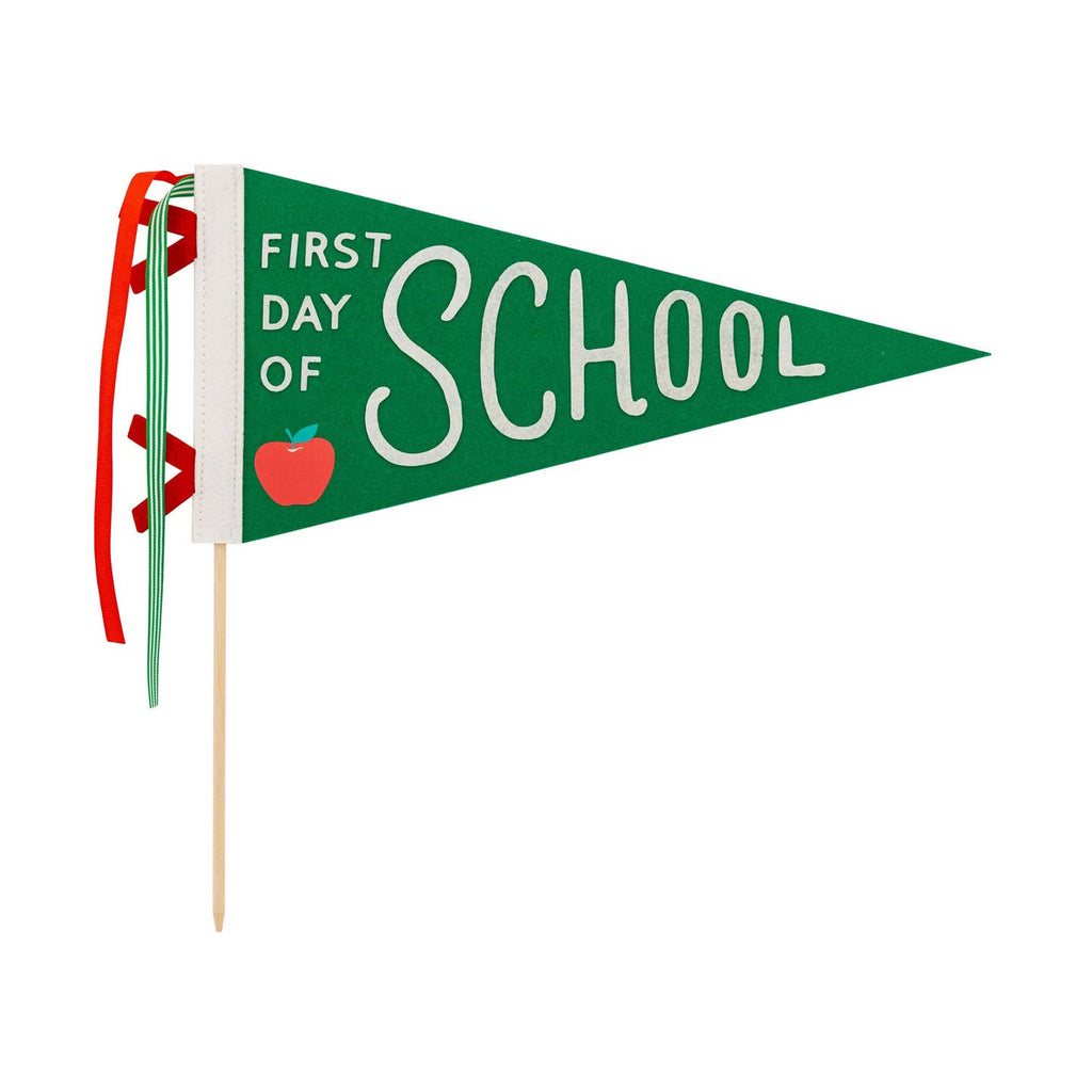 Celebrate the first day of school with this felt pennant. Perfect for back-to-school parties, this pennant will add a touch of fun and nostalgia to the event. Show off your school spirit and get ready to party!