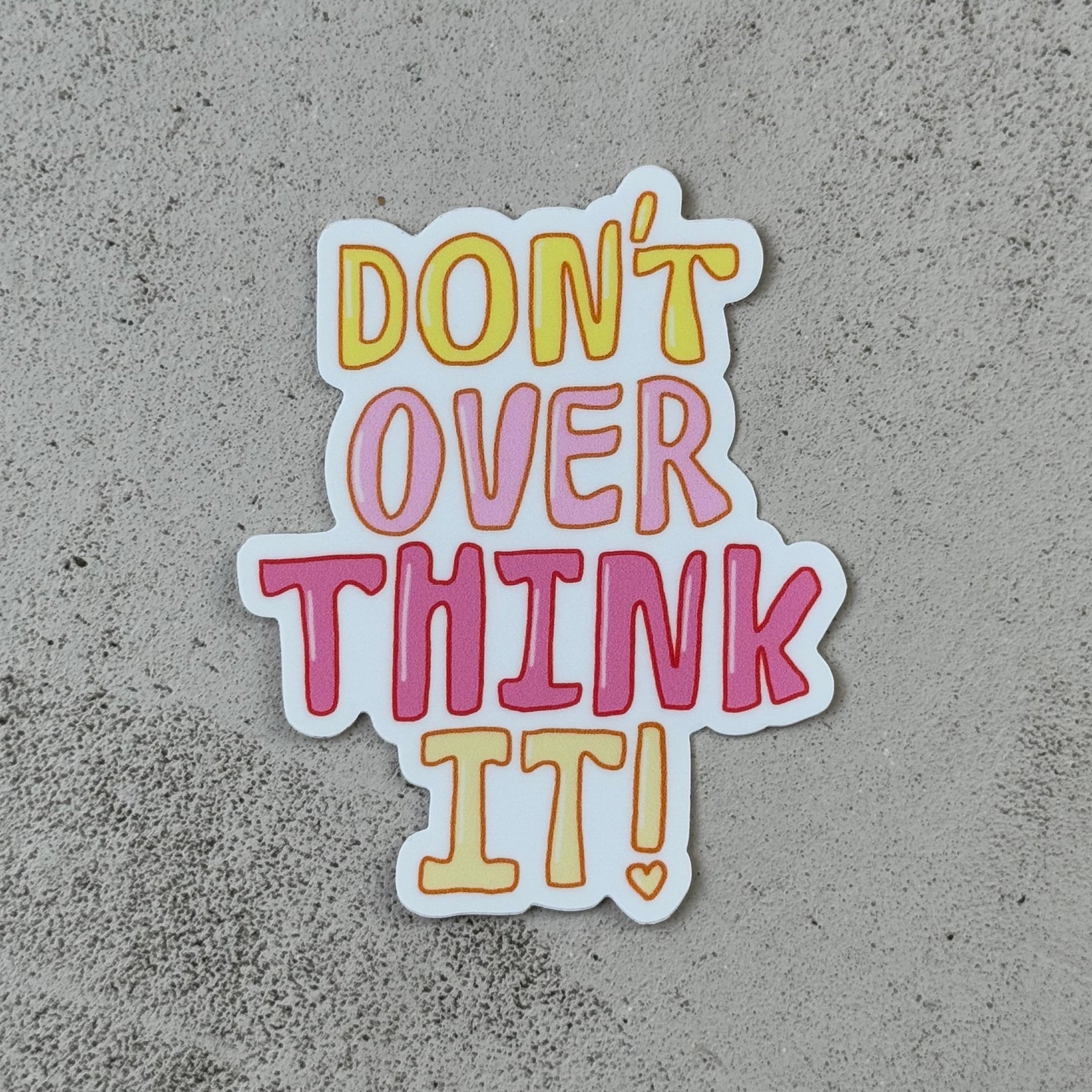 sticker reading "Don't Overthink it!" in different shades of yellow and pink