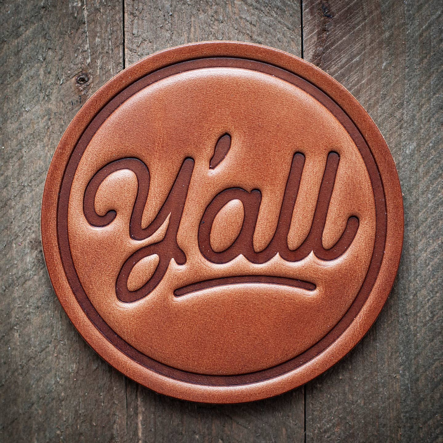 Our leather coasters are cut and pressed by hand from some of the thickest and finest harness leather available. They patina beautifully as they age. Customers love the ability to mix and match a variety of styles to make a classic set of coasters that really says, "I picked these out just for you!"

Size: 4”