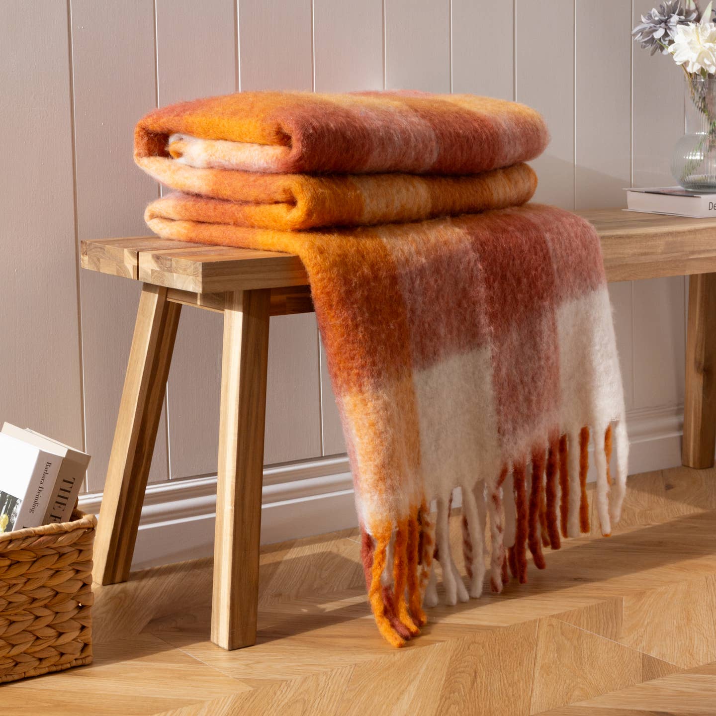 The Juno throw is made of a luxurious faux mohair fabric and was designed as an inspiration for a stunning winter scarf trend. This design, which has a large check pattern and a jumbo felted fringe, is a year-round investment piece in colours that are warming for your interior. Featuring an oversized faux mohair check design in trend-fitting colours. Complete with a reversible design and chunky jumbo felted fringe.