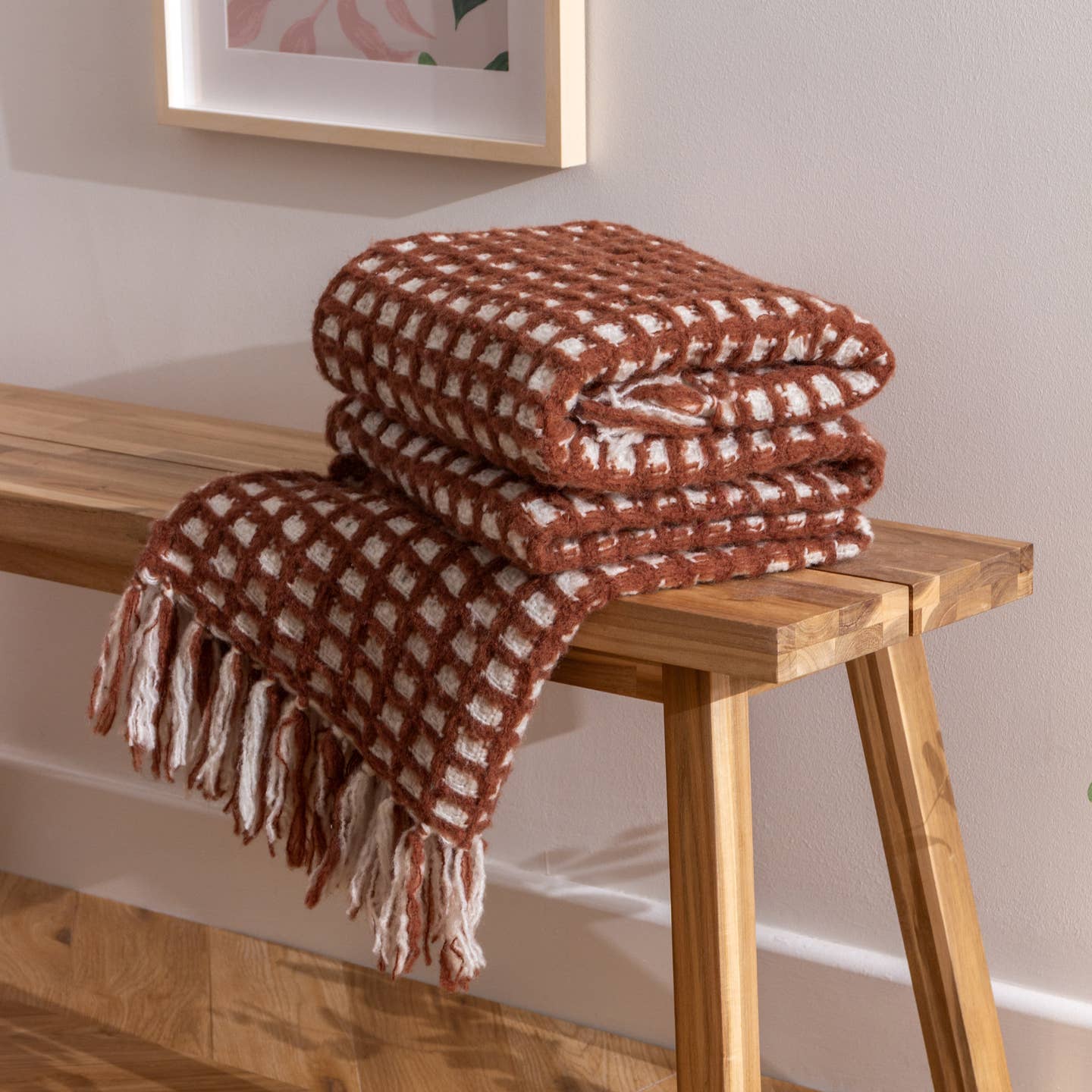 As warm as toast, the fashionable Toasty throw features an oversized waffle pattern and is complete with a complementing tassel fringe. Available in brick Scandinavian inspired color, this design is ideal for layering on any sofa or bed all year round.