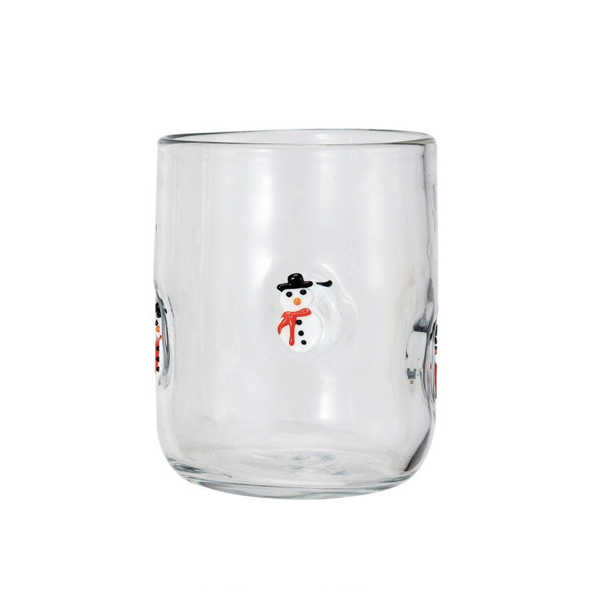 Clear glass tumbler with a snowman design on a white background