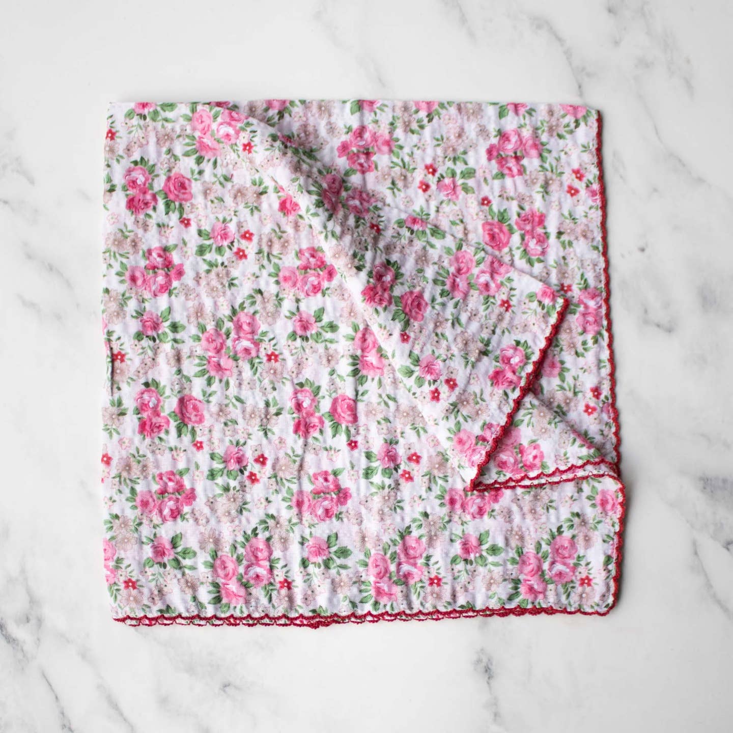 Wrap yourself in timeless elegance with the Rose Garden Cotton Scarf in soft pink. Featuring a vintage rose pattern, this scarf adds a gentle, feminine touch to any outfit. Its lightweight cotton fabric offers breathable comfort for all-day wear and versatile styling options—whether draped around your neck, tied to a bag, or used as a headscarf. Perfect for enhancing your look with subtle charm and cozy ease.