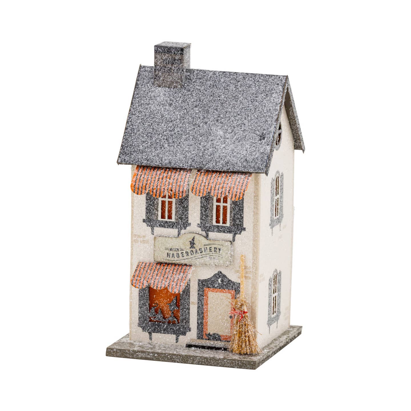 Enchant your village display with our whimsical Haberdashery house! This bewitching decor piece adds a touch of magical charm to any Halloween or seasonal arrangement. Perfect for creating a spellbinding miniature scene that will have guests spellbound. Mix and match with other village pieces for a complete mystical neighborhood that's ready to party!

Details:

House is 3.75 wide x 3.25" deep x 8" tall
includes battery powered light inside
BATTERIES NOT INCLUDED