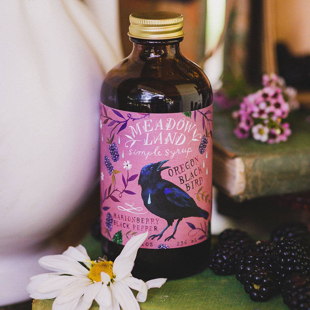 This Oregon-made, handcrafted simple syrup is a delightful addition to lemonade or a gin cocktail. Made with fresh marionberries and black peppercorns

• Tasting Notes: a velvet sky, the first-picked marionberry, intrigue, evening breeze

• Ingredients: pure cane sugar, water, Oregon marionberries, black pepper, cream of tartar 