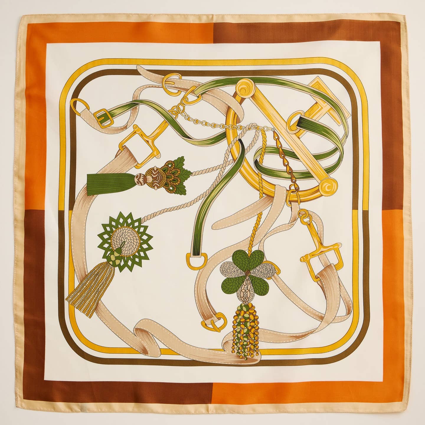 Elevate your style with this equestrian-inspired scarf, featuring an intricate design of buckles, tassels, and elegant bridles. This luxurious silk-like square scarf blends classic sophistication with modern versatility, perfect for adding a refined touch to your wardrobe. The soft, lightweight fabric drapes beautifully, making it ideal for wearing as a neck scarf, head accessory, or handbag accent.
