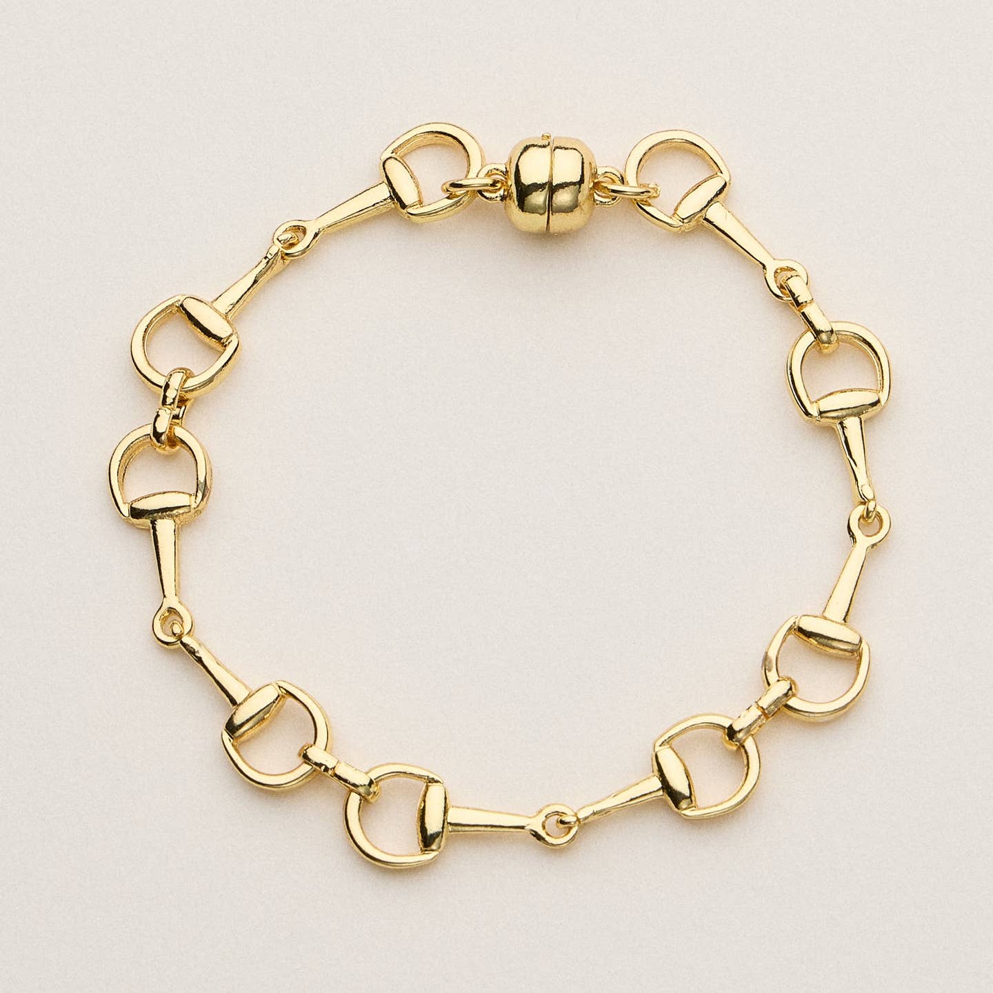 This bit chain bracelet comes in a gold tone finish, offering timeless equestrian-inspired style. Each bracelet features bold linked hardware crafted from durable base metal, perfect for stacking or standalone wear. A chic gift or everyday staple with effortless charm.