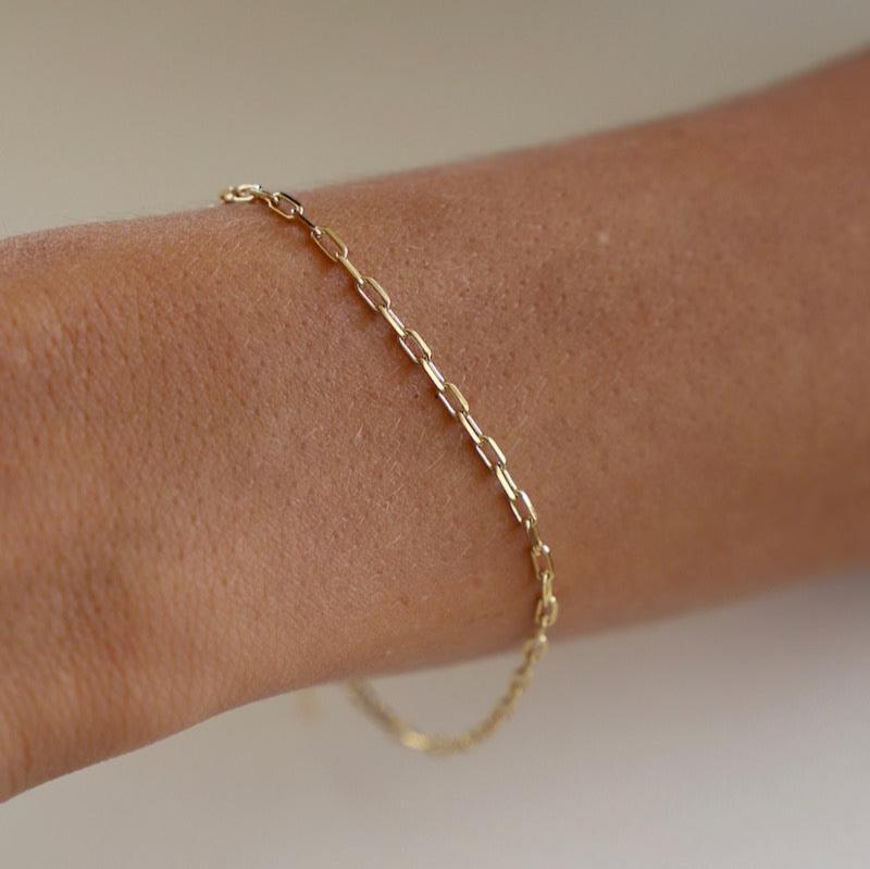 A delicate version of one of our most sought after styles, this Miniature Paperclip Chain Bracelet can be worn everyday with ease. This barely there chain is great for layering. 