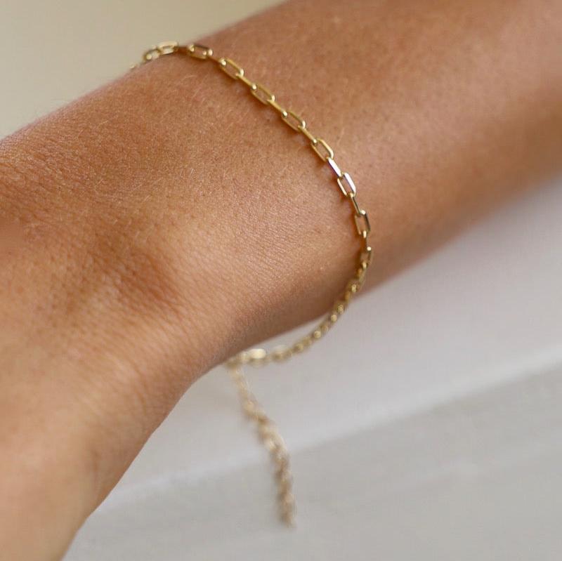 A delicate version of one of our most sought after styles, this Miniature Paperclip Chain Bracelet can be worn everyday with ease. This barely there chain is great for layering. 