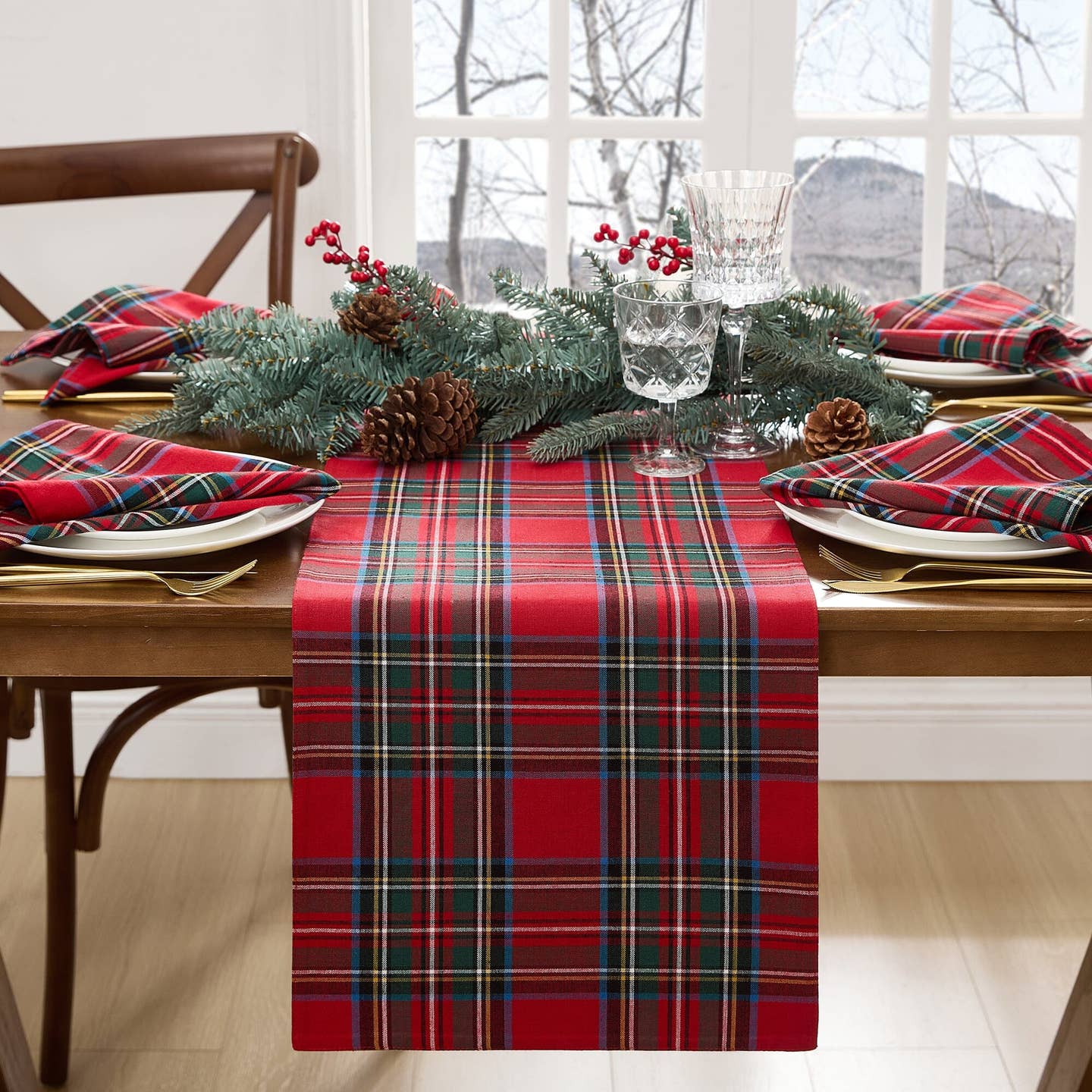 Elevate your holiday gatherings with our exquisite Stowe Tartan Plaid Table Runner. Versatile and elegant, this plaid table, console, mantle or buffet runner displays a yarn-dyed pattern in a festive color palettes featuring shades of Christmas red, hunter green, royal blue, gold and white to compliment a variety of seasonal dinnerware. Woven using premium quality 100% cotton, this traditional runner is available in two sizes and features a hemmed edge for added protection.