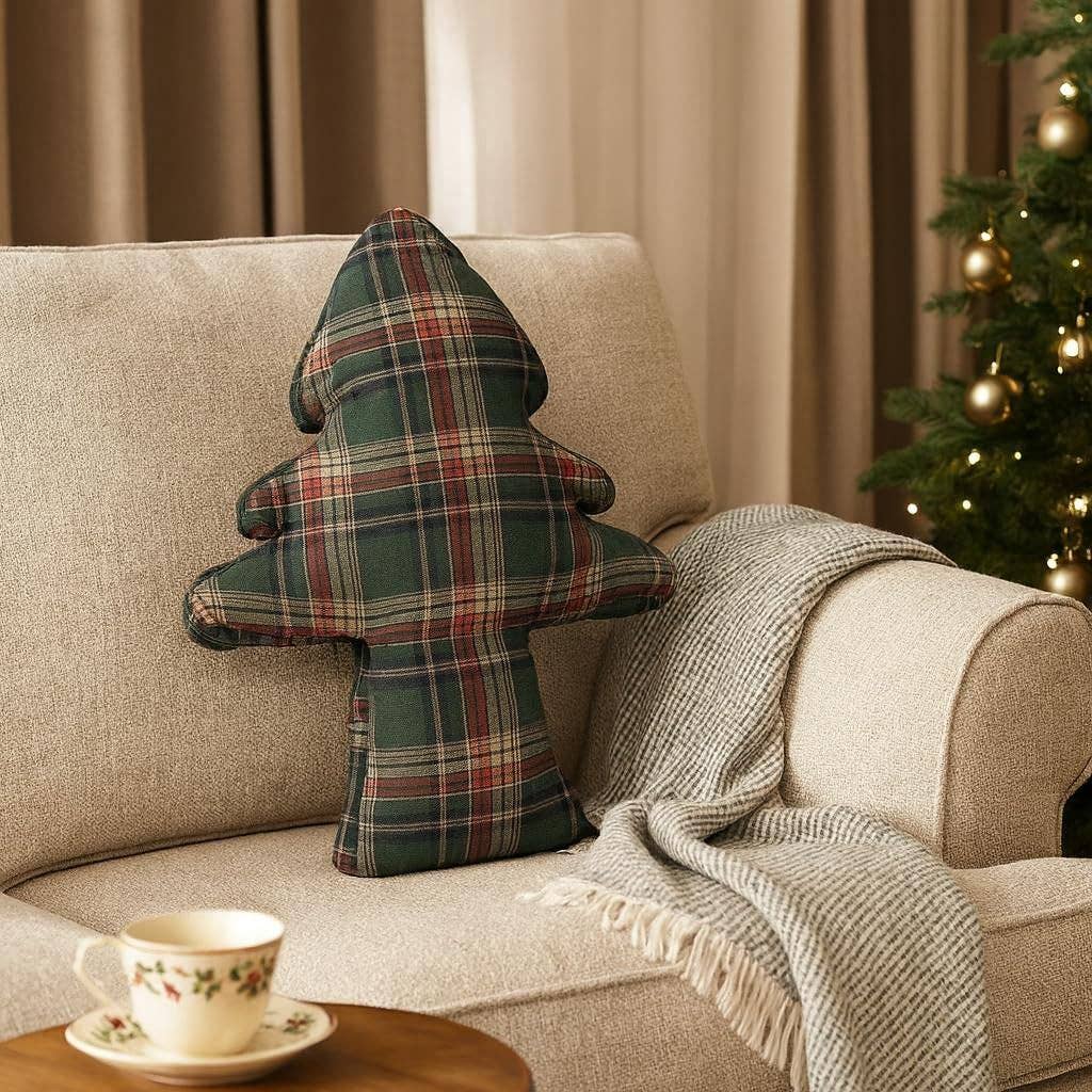 Bring festive cheer to your home with this charming tartan plaid Christmas tree pillow. Featuring a classic green plaid pattern, this uniquely shaped accent piece celebrates the holiday season with warmth and style. Perfect for adding a cozy touch to your sofa, armchair, or bed, it's an easy way to embrace seasonal décor without overwhelming your space. Whether you're decorating early or looking for that final festive detail, this pillow brings timeless holiday spirit to any room.

Details:

Size: 18"W x 24