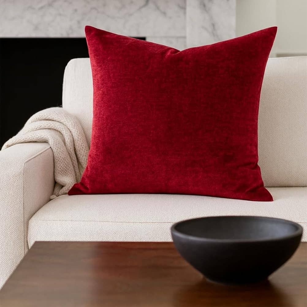 Elevate your holiday décor with the luxurious softness of this red velvet throw pillow. Its rich, sumptuous fabric adds instant elegance and warmth to any seating area, while the classic square shape complements both traditional and modern interiors. Toss it on your sofa, bed, or favorite reading nook for a touch of refined comfort. This versatile accent piece brings a sense of indulgence to your seasonal styling, making it the perfect way to create an inviting, festive atmosphere throughout your home.