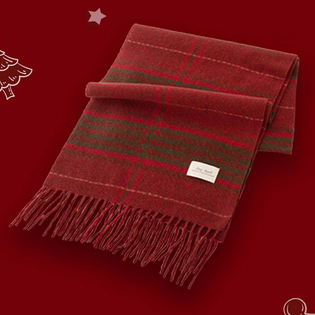 Soft and understated with a dusty red base and delicate touches of green. Minimal yet festive, this scarf adds a subtle hint of holiday charm to any look.

Details:

100% Polyester
Casual, light fitting scarf
Size: 37*200cm