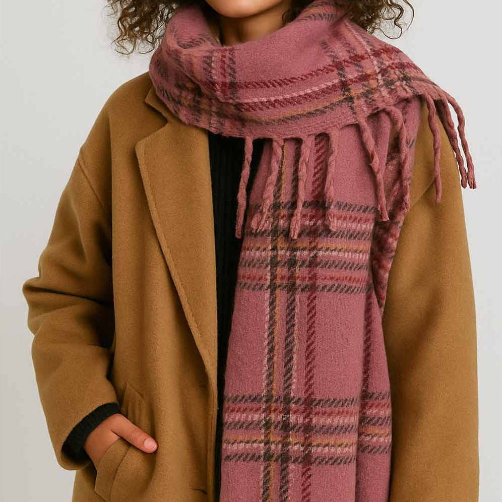 Wrap yourself in warmth and style with this mauve plaid knit scarf. Crafted from soft, cozy yarn with a classic plaid pattern, it's the perfect layering piece for cooler days. The fringed ends add a charming, finished touch that elevates any outfit. Whether you're heading out for a casual stroll or dressing up your everyday look, this versatile scarf brings both comfort and character to your wardrobe.

Details:

100% Polyester
Casual, light fitting scarf
Size: 40*185cm