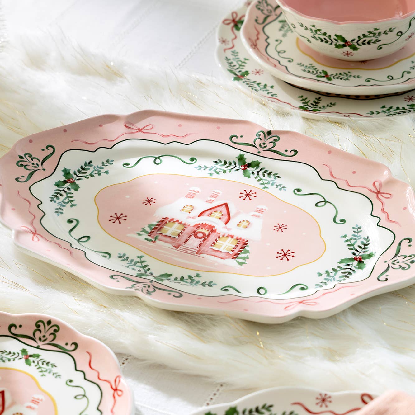 Bring festive cheer to your holiday table with this whimsical Christmas House Pink Serving Platter. Adorned with charming holly and bow details, this cheerful piece captures the magic of a cozy holiday home. Perfect for displaying appetizers, cookies, or seasonal treats, it's a delightful way to celebrate the season while adding a touch of festive flair to your gatherings. Let this playful platter help you create memorable moments with loved ones.

Details:

Plate Dimension: 1" Height x 14.5" Length x 9.6" 